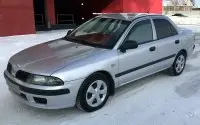 Мицубиси Carisma 2003 года