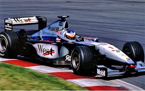 А вот тот самый чемпионский McLaren MP4/14 с…