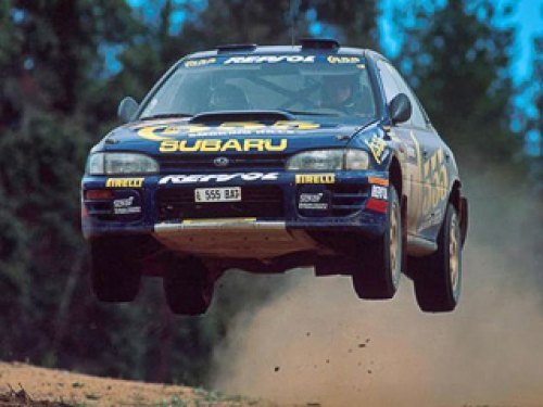На Импрезе команды Subaru World Rally Team с…