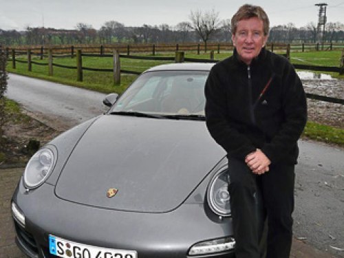 За рулём купе Porsche 911 Carrera Клаус Нидцвидц…
