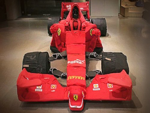Масса настоящего болида F1 — около 600 кг. Какого…
