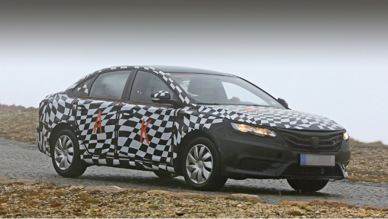 Характерная для Roewe решётка радиатора и…