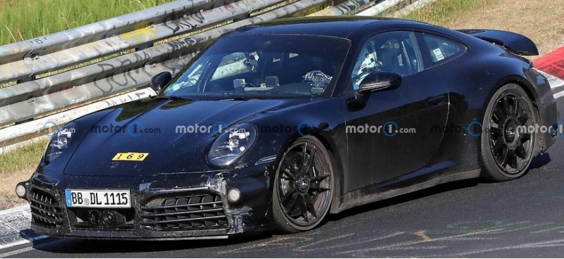 На тестах замечен прототип гибридного Porsche 911…