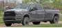 Открыть статью Пикап Ram 3500 2023 года раскрыл новые подробности на шпионских фото