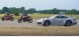 Porsche 911 Turbo S пытается обогнать два байка MotoGP в драг-рейсинге