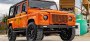Ателье ECD представило классический Land Rover Defender с ярко оранжевым…