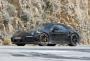 Компания Porsche тестирует гибридную версию спортивного 911 Turbo