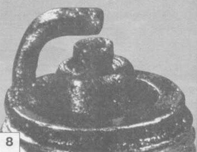 Блестящий черный нагар свидетельствует о…