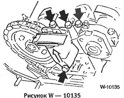 Снять кронштейн верхнего натяжителя цепи.