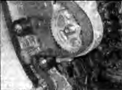 Рис. 2D.21. Установка зубчатого ремня на шкив…