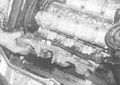Рис. 11.63. Снятие нижней секции впускного…