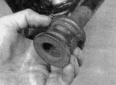 Рис. 8.7. Замена резиновой опоры штанги…