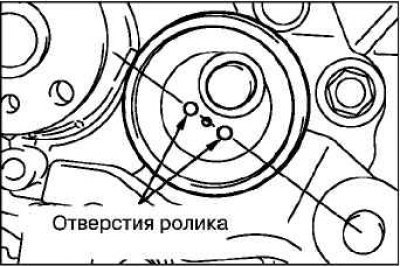 Установите и временно закрепите ролик натяжителя…
