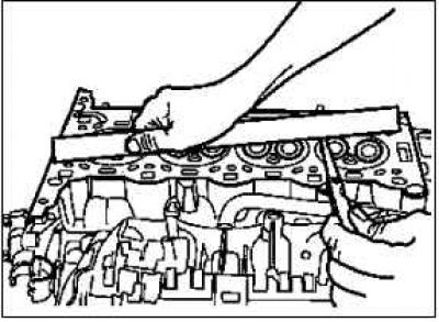 Вставьте на ее место приспособление KM-952 2.