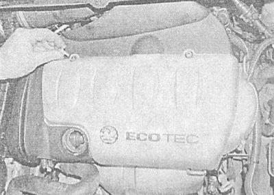 1. На моделях 1.4, 1,6 и 1.8 л DOHC снимите…