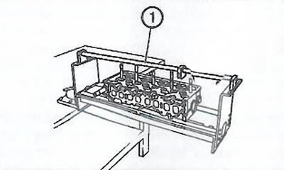 10. Снять поперечину (1).