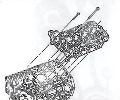 4. Снять головку блока цилиндров с выпускным коллектором.