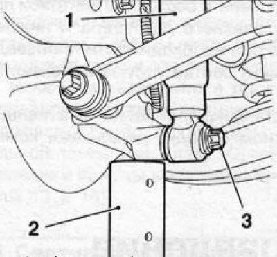 8.3 Приподнимите держатель ступичной сборки…