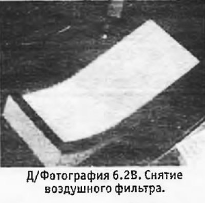 2. Ослабить пружинные зажимы, поднять крышку…