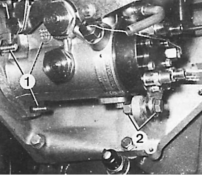 1 – болты крепления; 2 – задний кронштейн