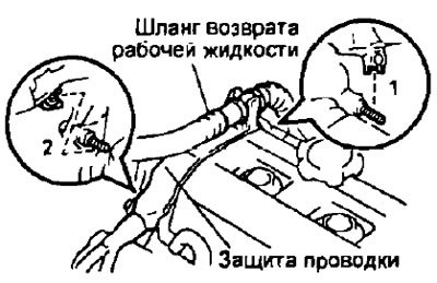 д) Снимите два зажима защиты жгута проводов от…