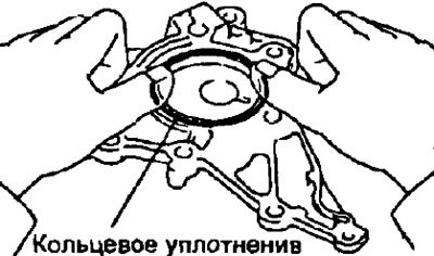в) Разместите новое кольцевое уплотнение.