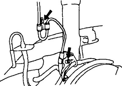в) Отверните два болта, крепящих кронштейны жгута…