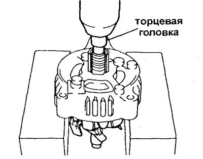 в) При помощи торцевой головки и пресса…
