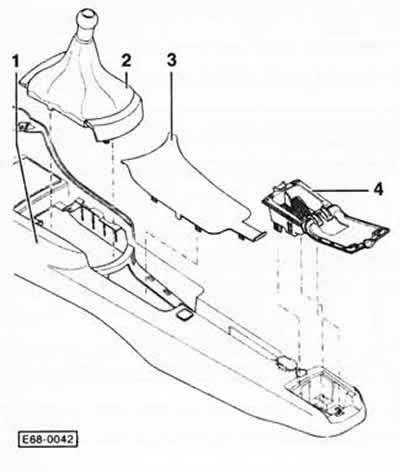 Открыть крышку задней пепельницы -4- и движением вверх вынуть пепельницу из центральной консоли -1-.