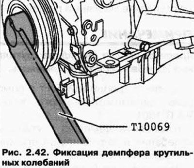 Снимите ведомый диск. Для этого зафиксируйте…