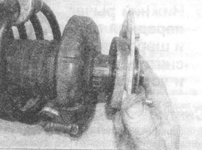 Рис. 4.5, а. Снимите верхнюю опору...